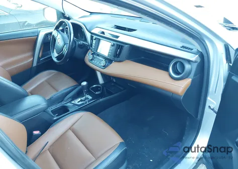 2016 Toyota Rav4 Hybrid Limited из США, поврежденный, VIN JTMDJREV9GD009323